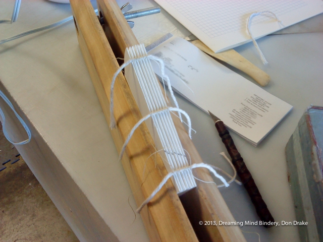A look at the packed sewing used to bind Don Drake's original work *So Different*.