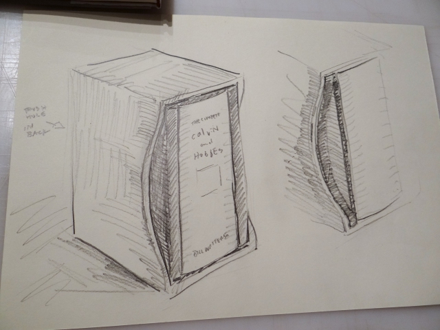 Sketch of a slipcase design with an additional wrapper that doubles as a support cradle