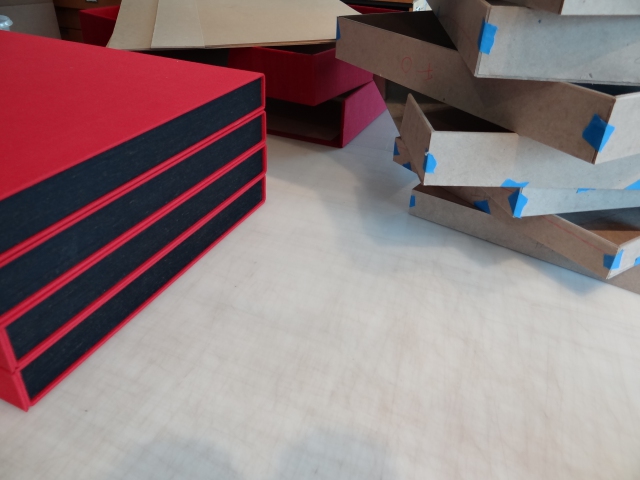 Boxes in several stages of completion (including conceptual)