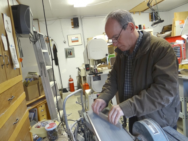 Sanding the rails for a box to the proper dimensions