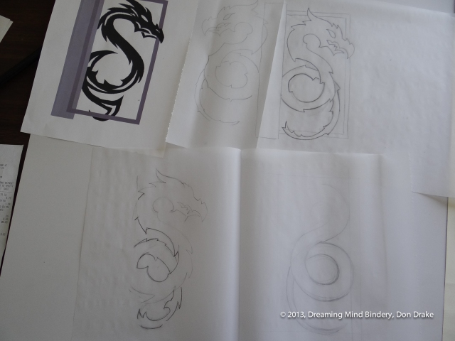 Preliminary sketches of a dragon design to be used in a copper journal cover.