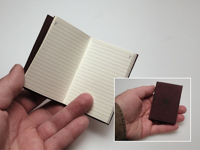 A pocket sized address book covered in goat.