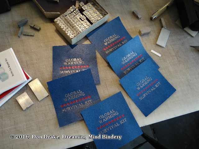 Labels after foil stamping for Don Drake's editions 'Global Warming Survival Kit'