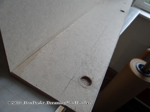 Holes in the wall of a box for rare earth magnets.
