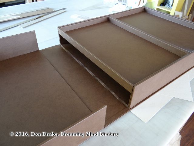 The interior of Oliver Klink's clamshell box showing the two removable trays in place