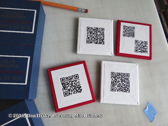 B-sides of the 4 panels in Don Drake's Global Warming Survival Kit showing the QR code content