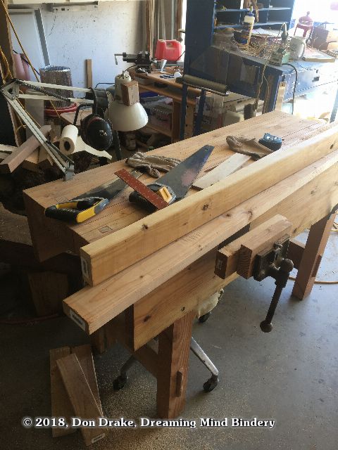 Preparing to cut the first pieces for a new tool shed.