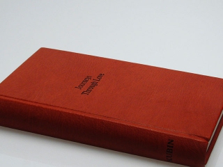 A full leather binding of poetry, created for the author as a Valentin's Day gift for his wife.